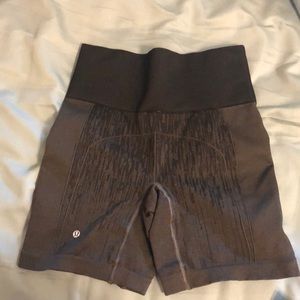 Lululemon short, olive green with gray design.